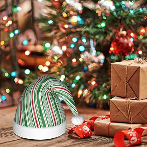 Fundo de Natal de cana -de -hortelã -pimenta com listras diagonais e chapéu brilhante de flocos