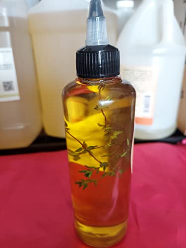 Tratamentos de óleo misto para o crescimento do cabelo com folhas de tomilho fresco